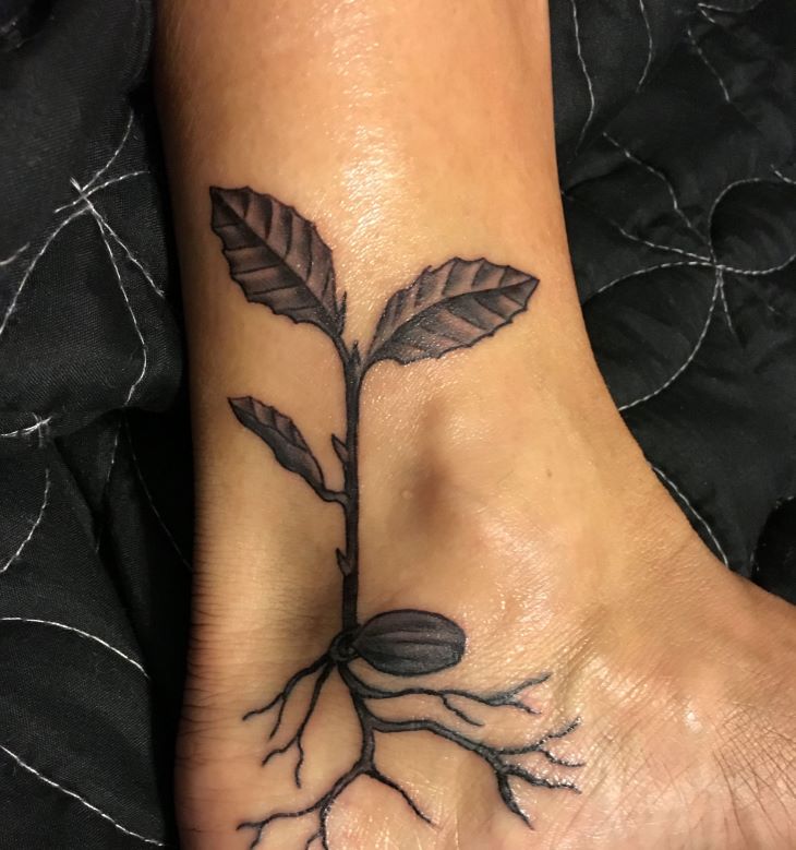 Art in Miniature: Unveiling the Graceful Beauty of Tiny Sapling Tattoos